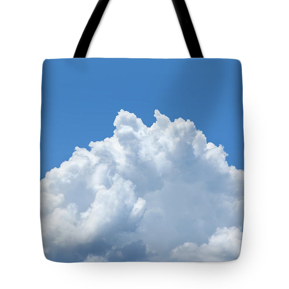 Scenics Tote Bag featuring the photograph Big White Cumulus Cloud With Blue Sky by Grafissimo