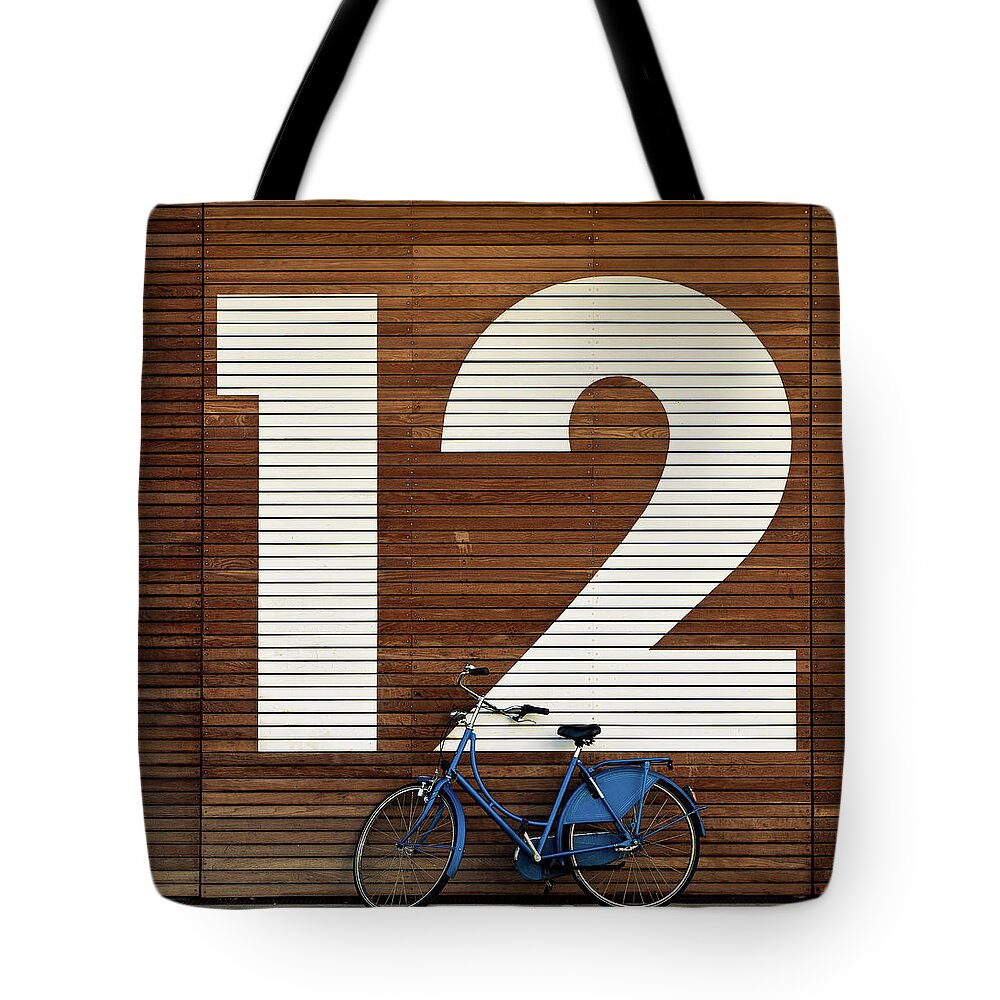 Leaning Tote Bag featuring the photograph Bike Against Big 12 by Sebastian Steiner