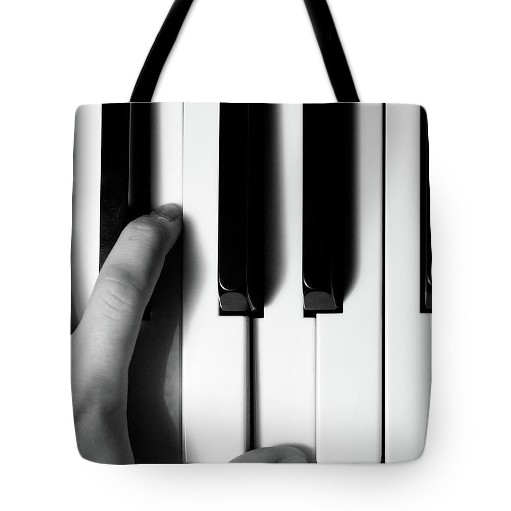 Piano Tote Bag featuring the photograph Black And White Piano by Daniel Candal