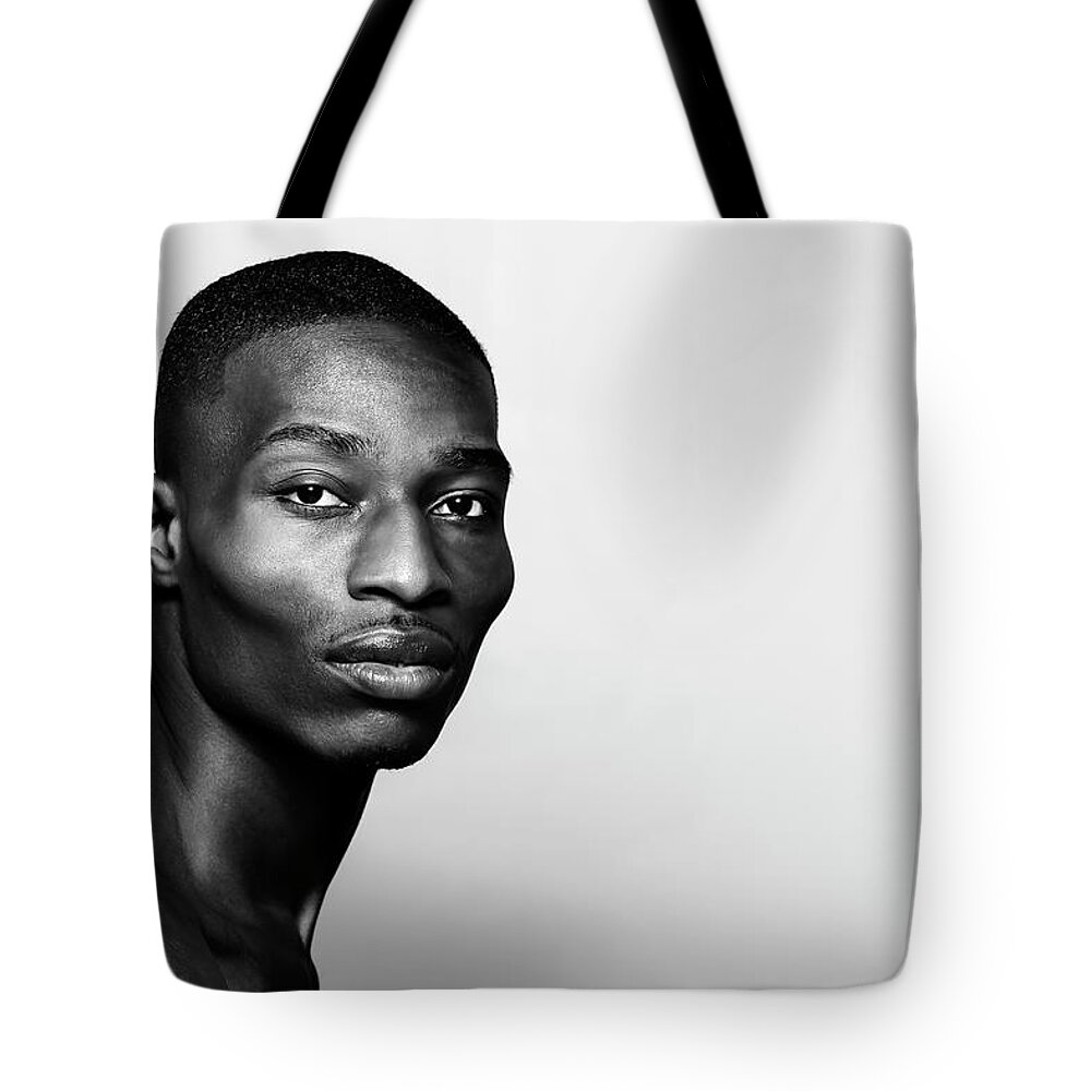 People Tote Bag featuring the photograph Black_male_dancer_dracinc_portrait by Dracinc / Donn Thompson