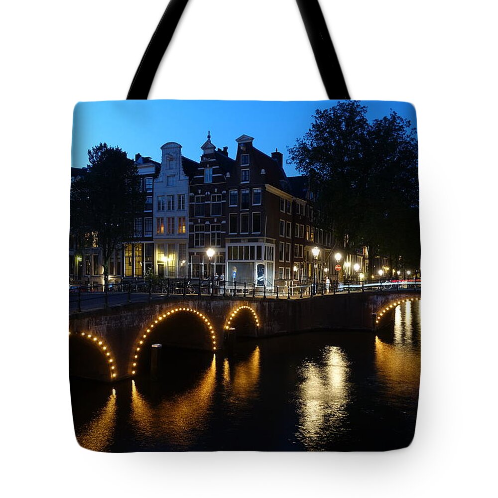 Blue Hour Tote Bag featuring the photograph Blue hour in Amsterdam by Patricia Caron
