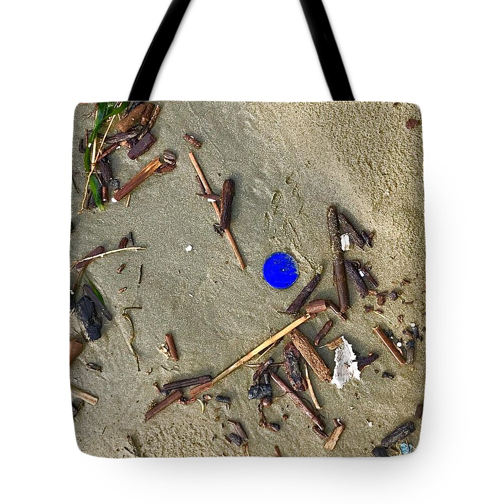 Blue Tote Bag featuring the photograph Blue Plastic on Sand by Suzanne Lorenz