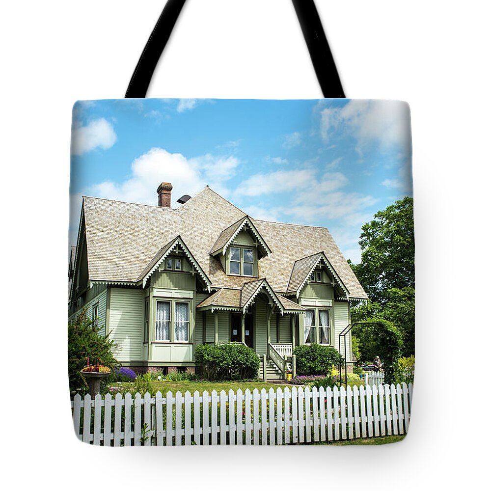 Blue Sky And Picket Fence Tote Bag featuring the photograph Blue Sky and Picket Fence by Tom Cochran