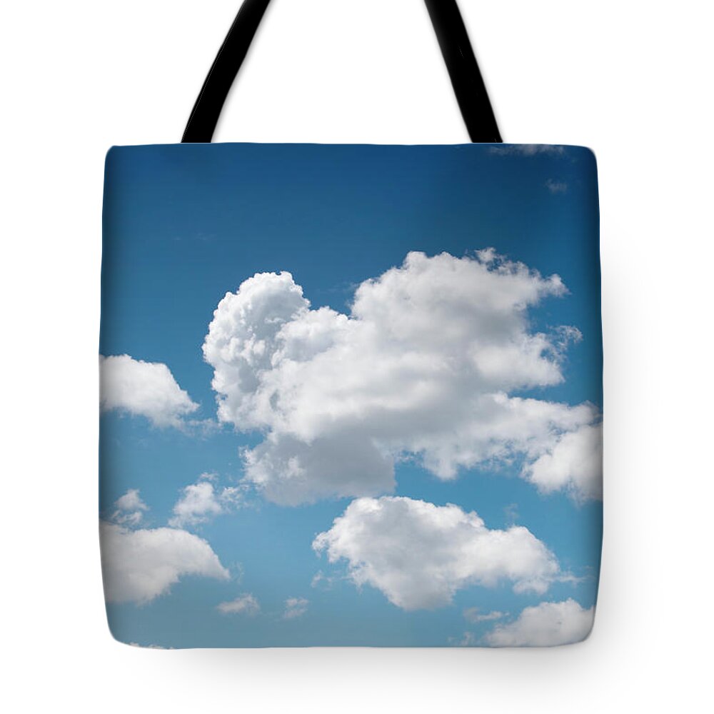Dreamlike Tote Bag featuring the photograph Blue Sky With Clouds by Mbbirdy