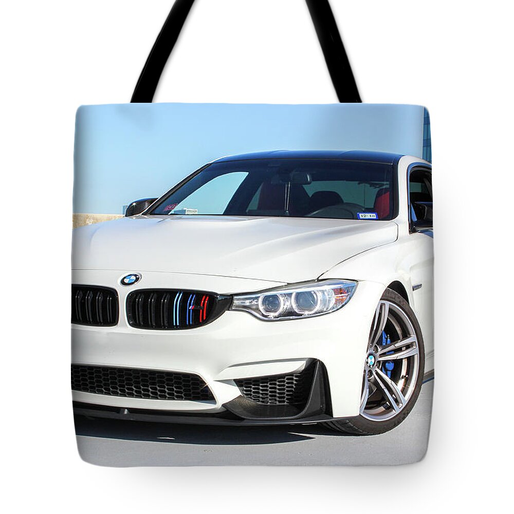 Bmw M4 Tote Bag featuring the photograph Bmw M4 by Rocco Silvestri
