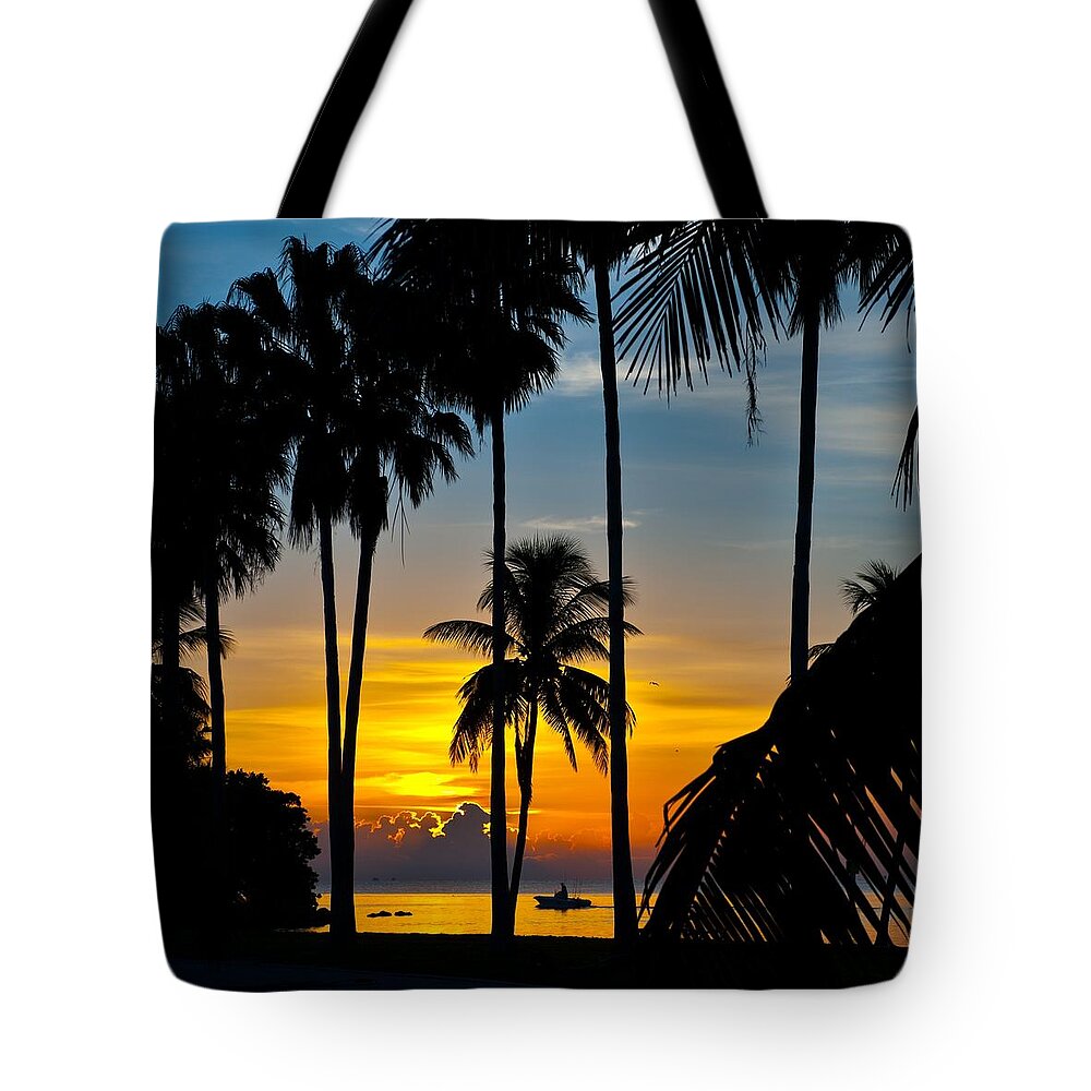 Sunsets Tote Bag featuring the photograph Boater on Biscayne Bay by Edgar Estrada