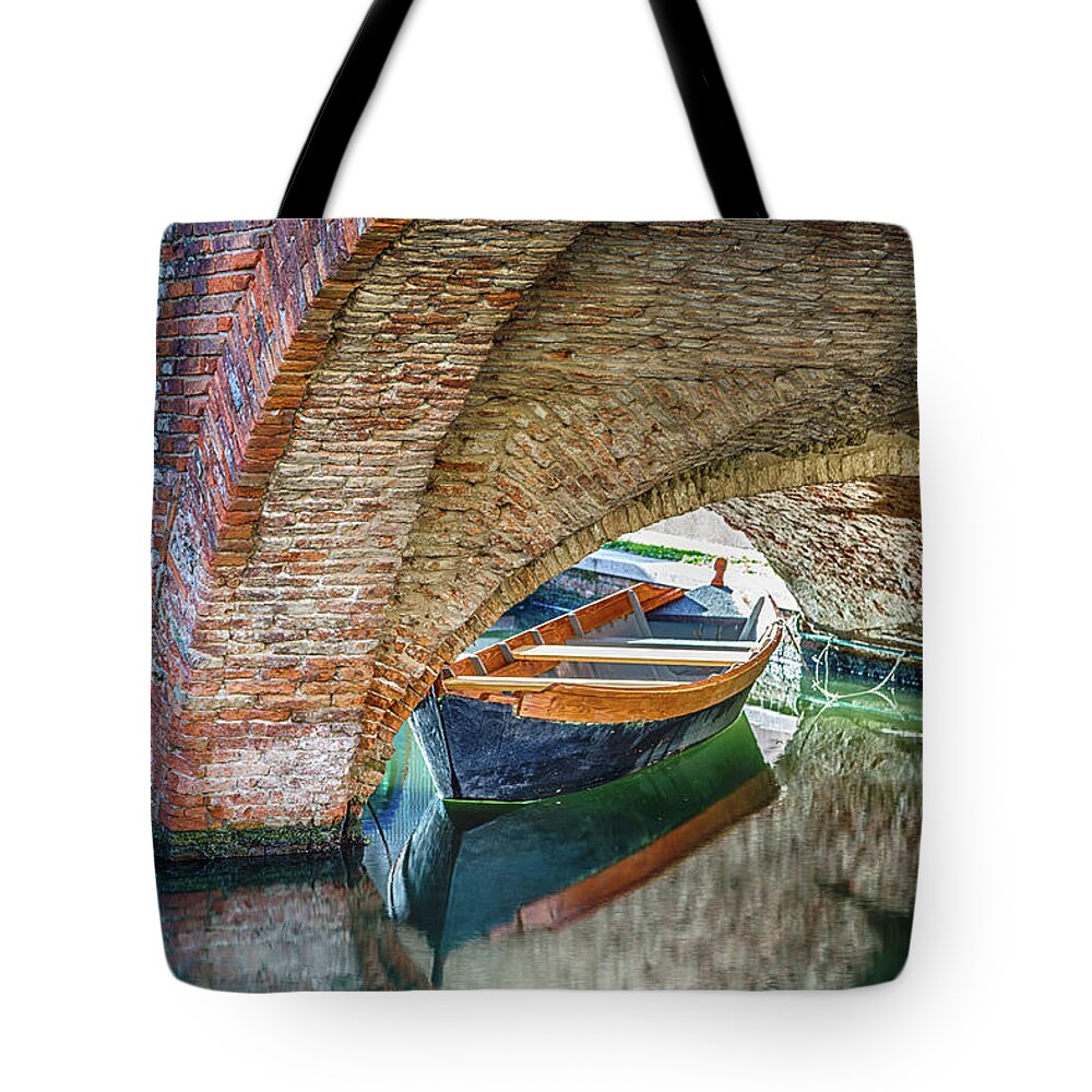 Boats Tote Bag featuring the photograph boats and bridges in Comacchio, the little Venice by Vivida Photo PC