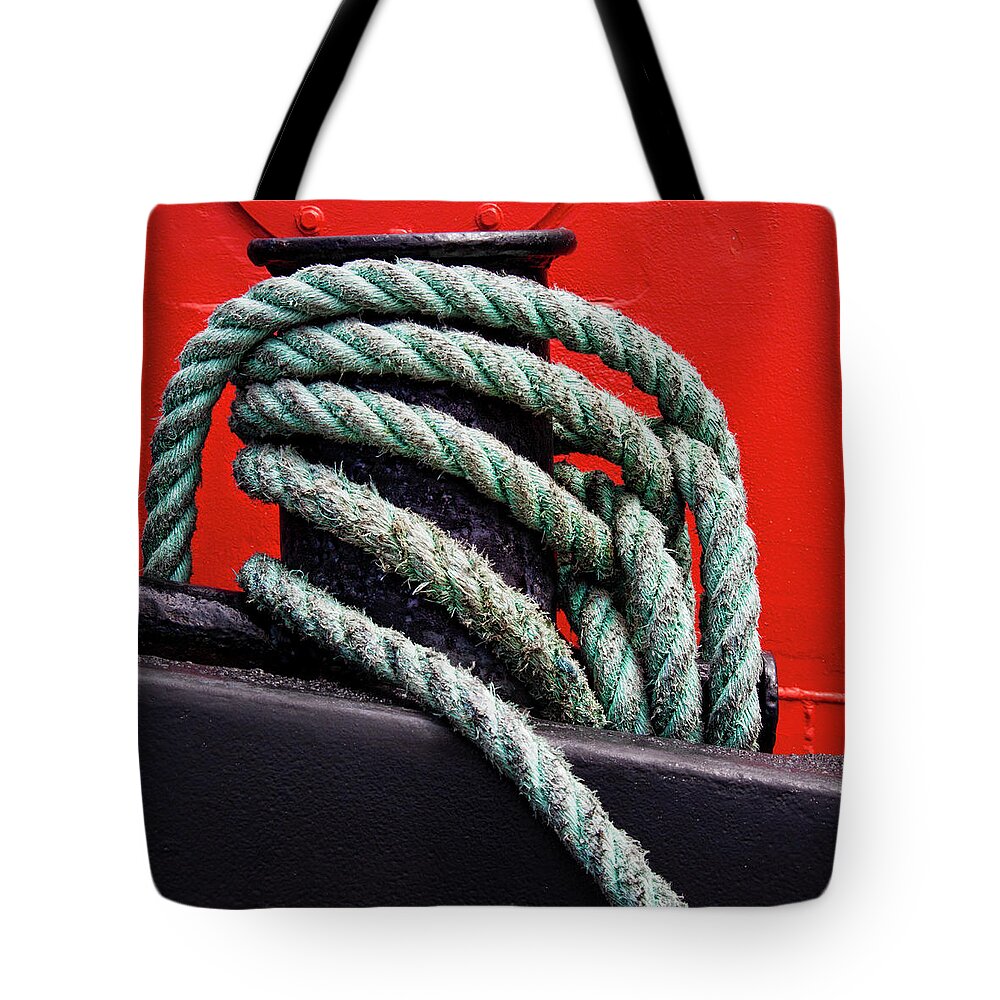 Red Tote Bag featuring the photograph Bollard on a Bright Red Boat by Carol Leigh