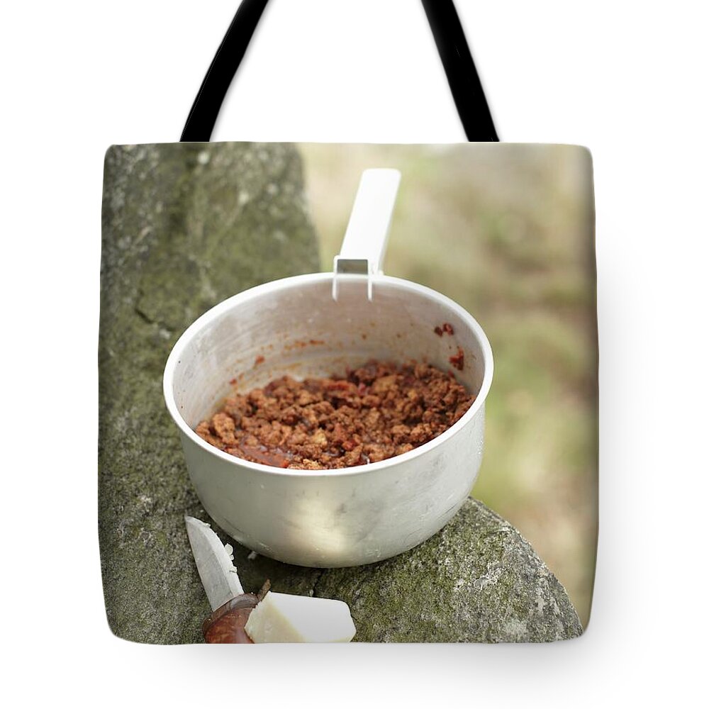 Ip_11419330 Tote Bag featuring the photograph Bolognese Sauce, A Pocket Knife And Cheese For Camping On A Rocky Ledge by Hannah Kompanik