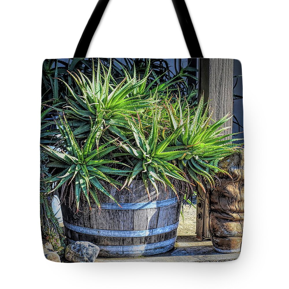 Boots And Barrels Tote Bag featuring the photograph Boots and Barrels by Barbara Snyder