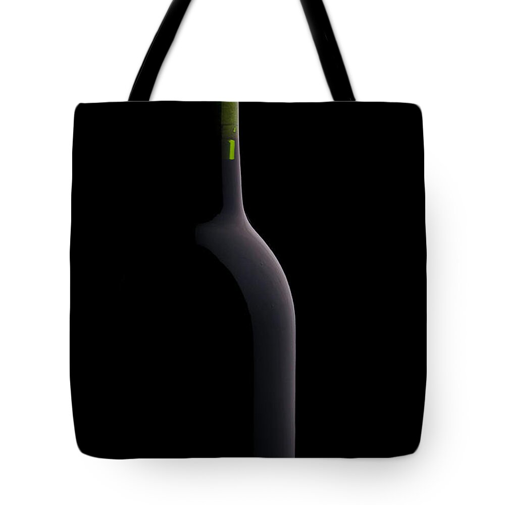 Alcohol Tote Bag featuring the photograph Bottle Of Wine by Halbergman