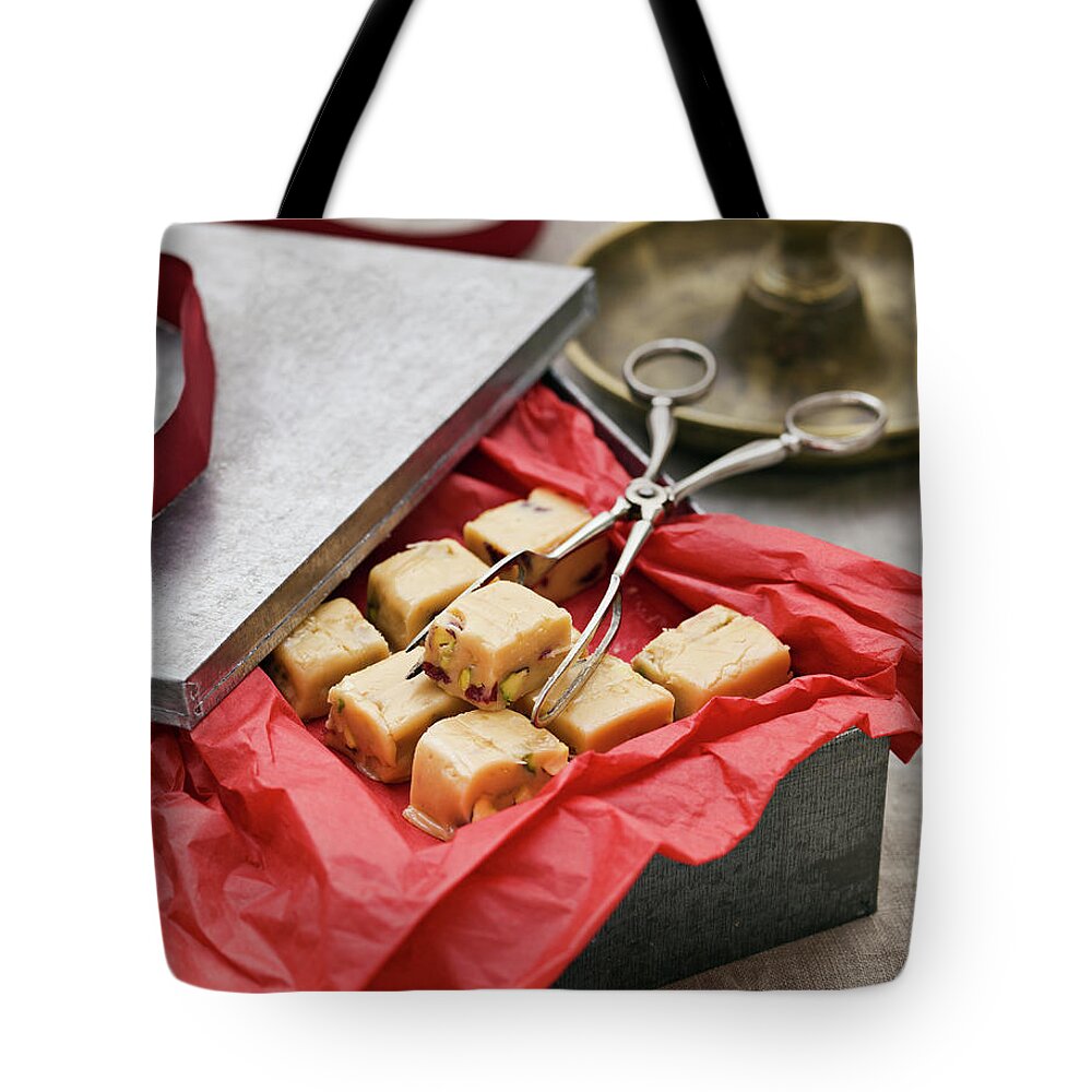 Sweden Tote Bag featuring the photograph Box Of Toffee Candies by Johner Images