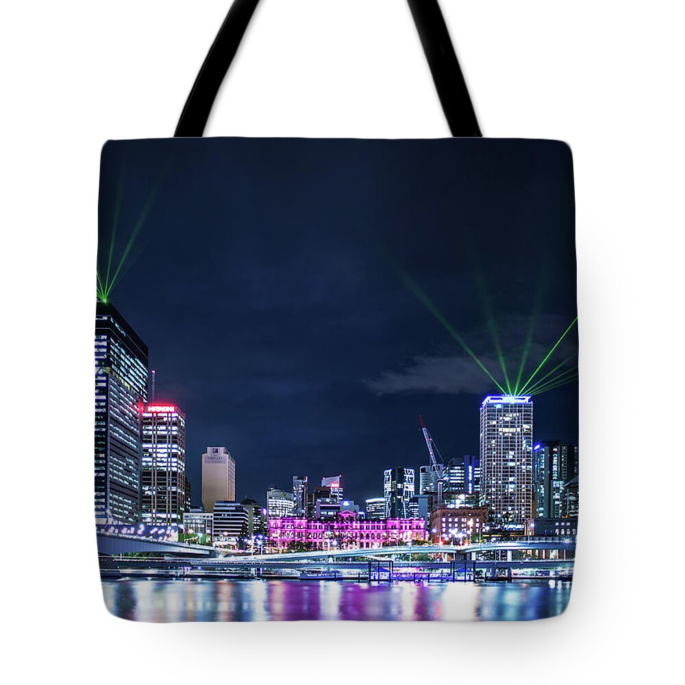 Laser Tote Bag featuring the photograph Brisbane Light Show by Photography By Byron Tanaphol Prukston