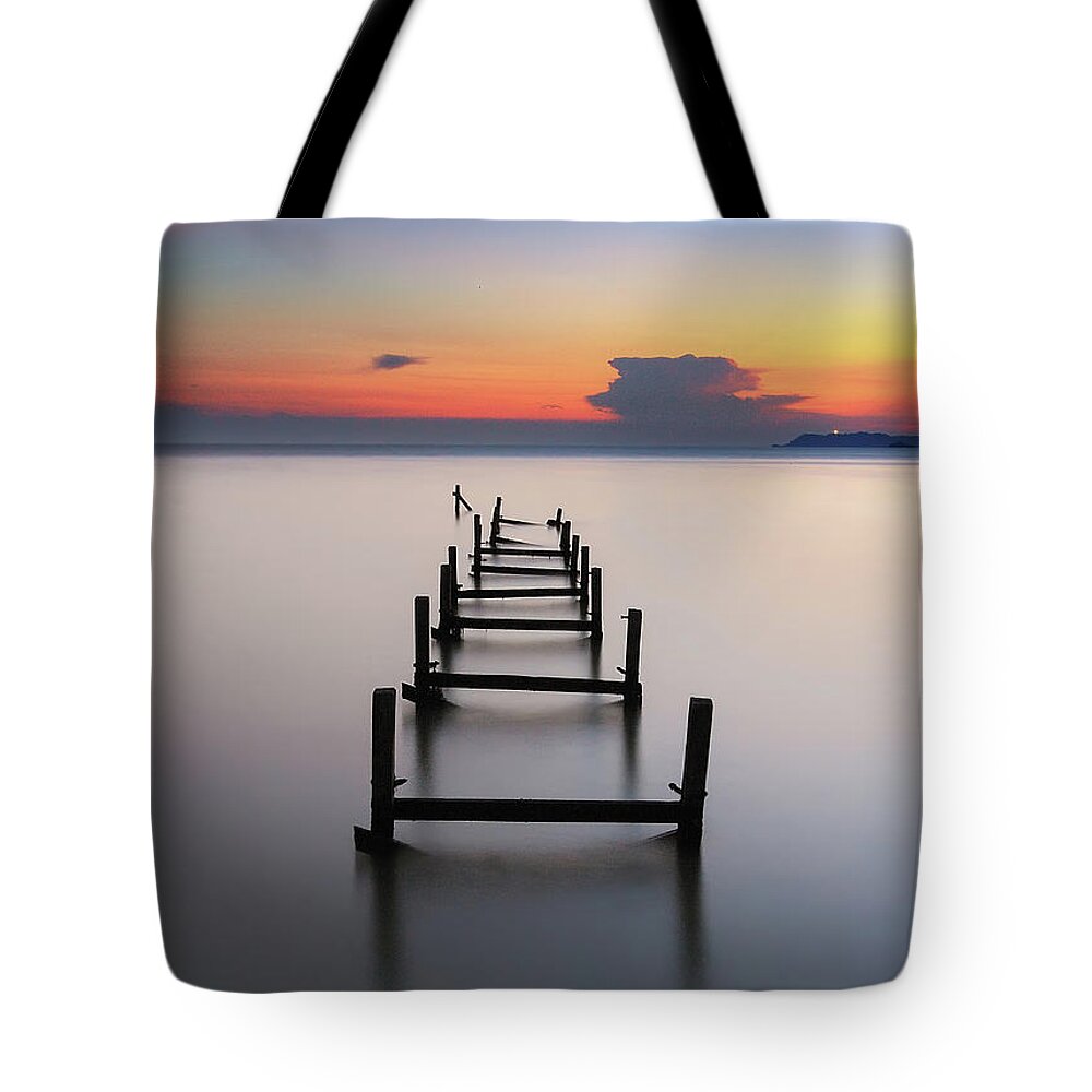 Tranquility Tote Bag featuring the photograph Broken Jetty Sunset by Fakrul Jamil Photography