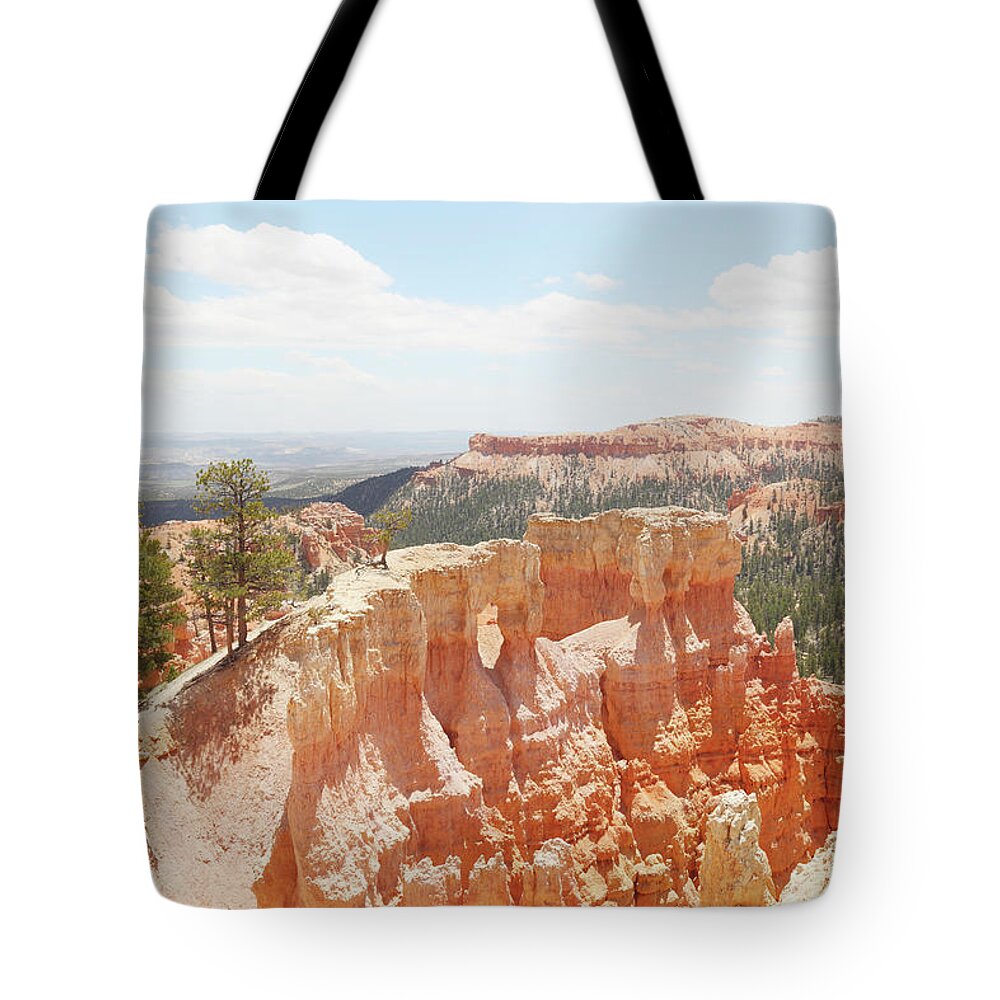 Scenics Tote Bag featuring the photograph Bryce Canyon Cliff Rock Formation by Arturbo