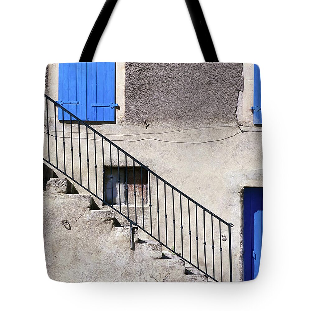 Steps Tote Bag featuring the photograph Building Facade And Staircase by John W Banagan