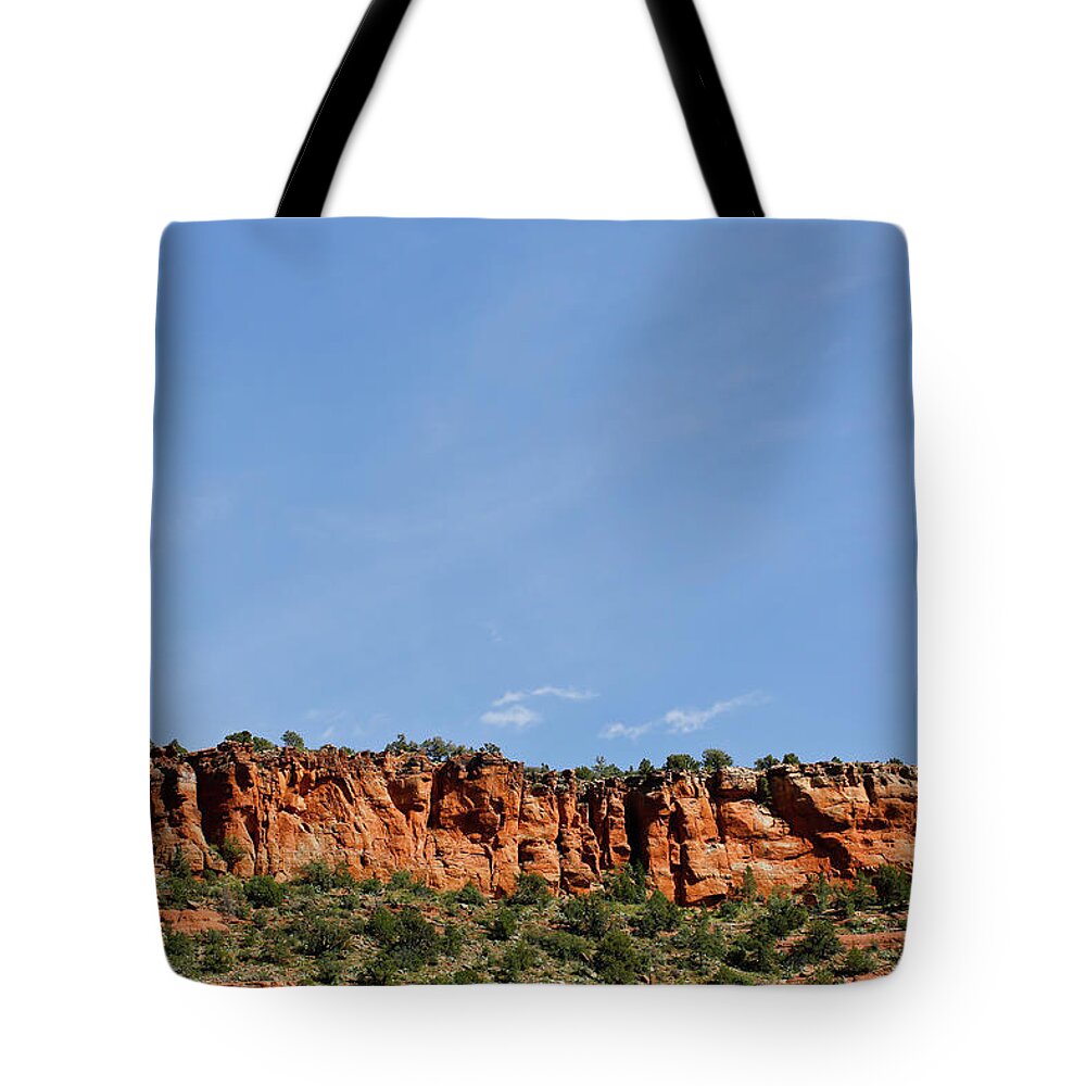 Scenics Tote Bag featuring the photograph Butte Against Blue Sky In Sedona by Www.mileswillis.co.uk