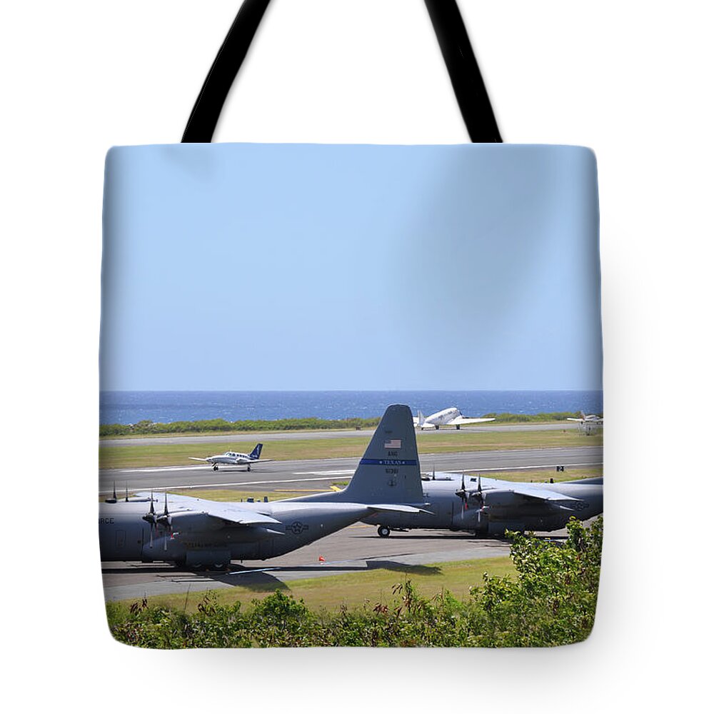 Us Air Force Tote Bag featuring the photograph C130H at Rest by Climate Change VI - Sales