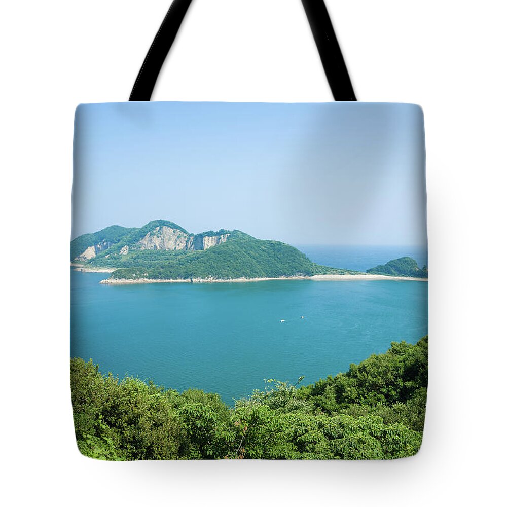 Scenics Tote Bag featuring the photograph Calm Inland Sea With Lush Island Bay by Ippei Naoi