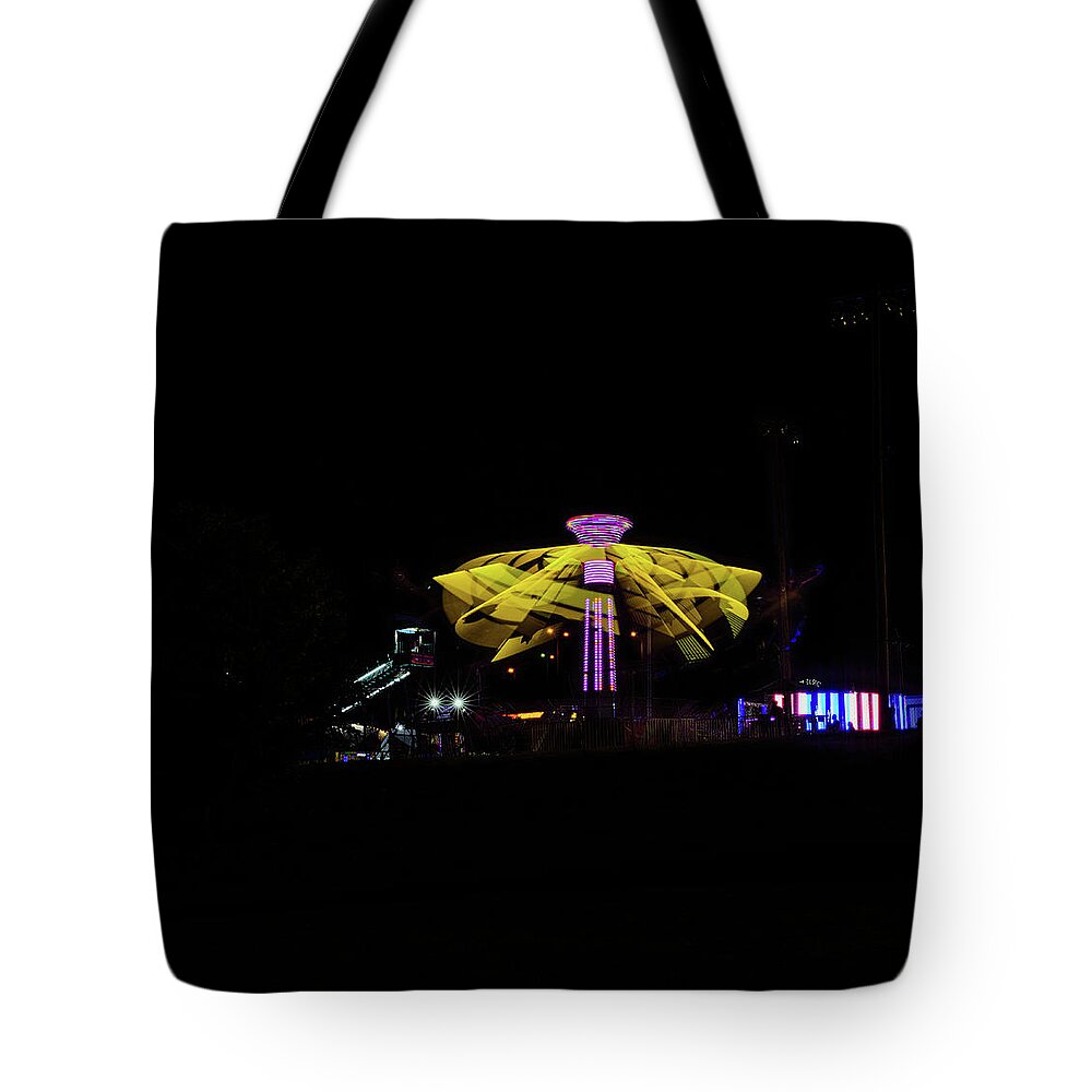 2019 Tote Bag featuring the photograph Carnival ride 1 by Kelly Kennon