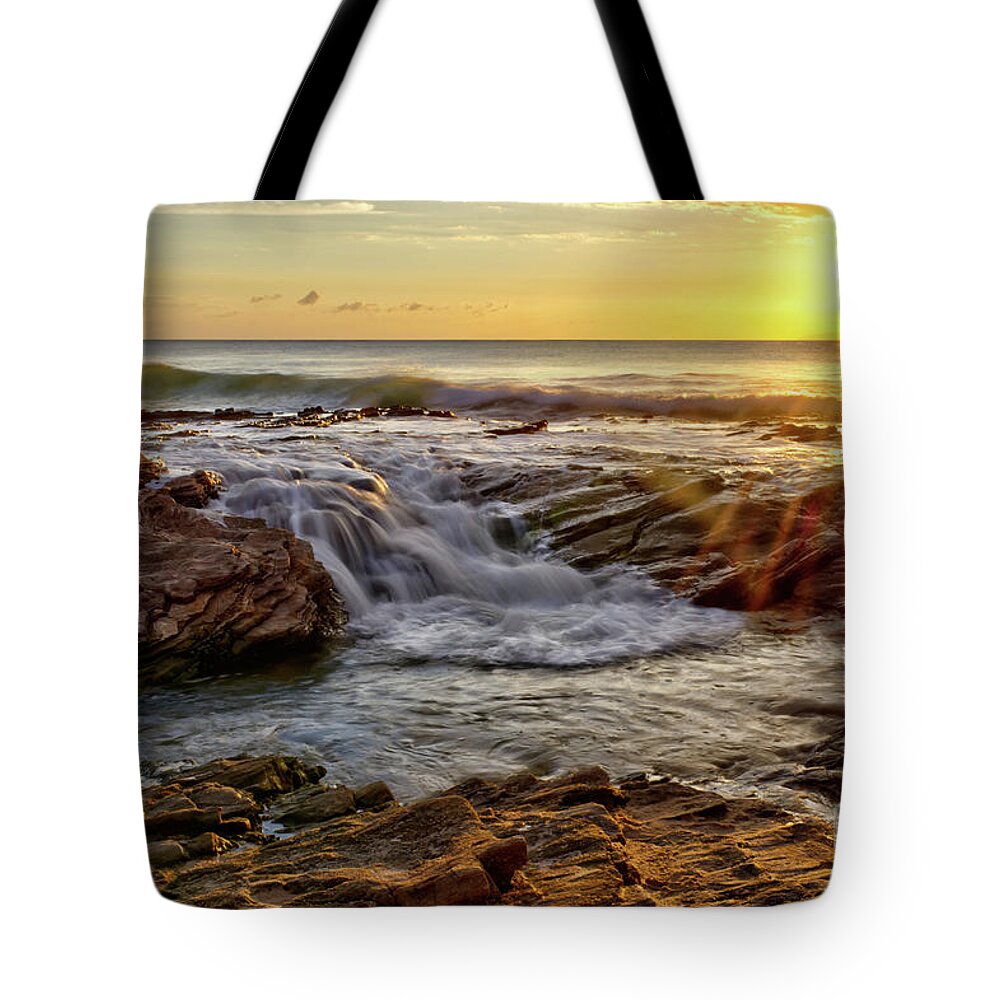 Cascading Tote Bag featuring the photograph Cascading Sunset at Crystal Cove by Eddie Yerkish