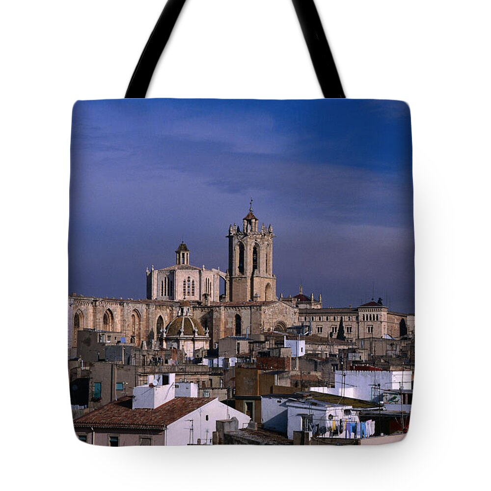 Catalonia Tote Bag featuring the photograph Cathedral Above Town Rooftops by Anders Blomqvist