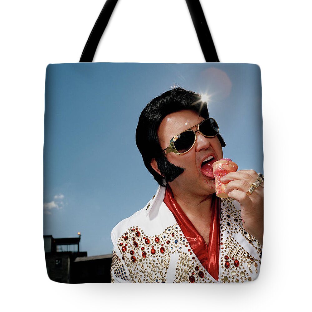 Food And Drink Tote Bag featuring the photograph Celebrity Impersonator Eating Ice Cream by Matthias Clamer