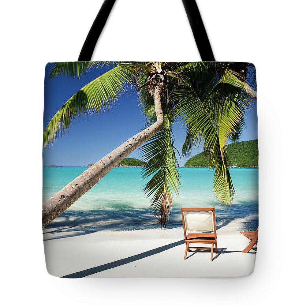Empty Tote Bag featuring the photograph Chairs Under Palm Trees At A Beach In by Cdwheatley