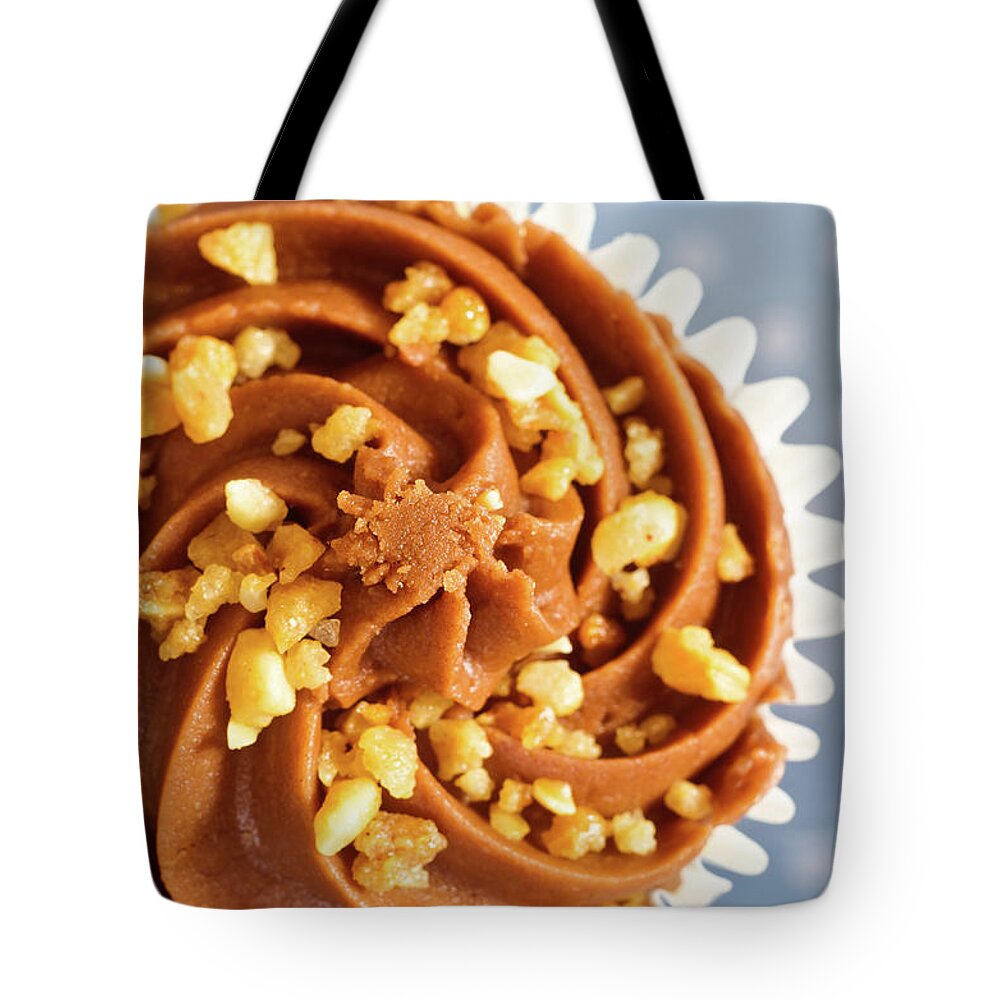 Nut Tote Bag featuring the photograph Chocolate Cupcake With Nuts by Sarah Beresford