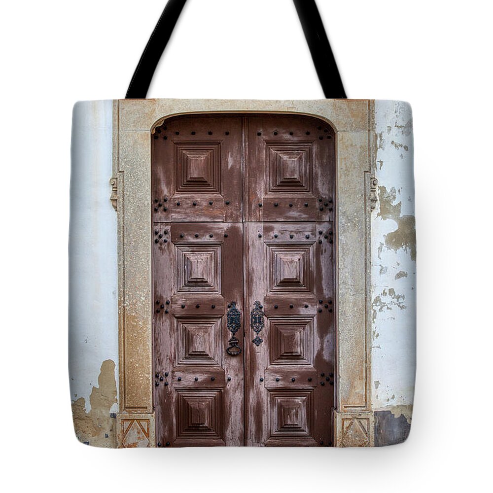 Castle Tote Bag featuring the photograph Church Door of Obidos by David Letts