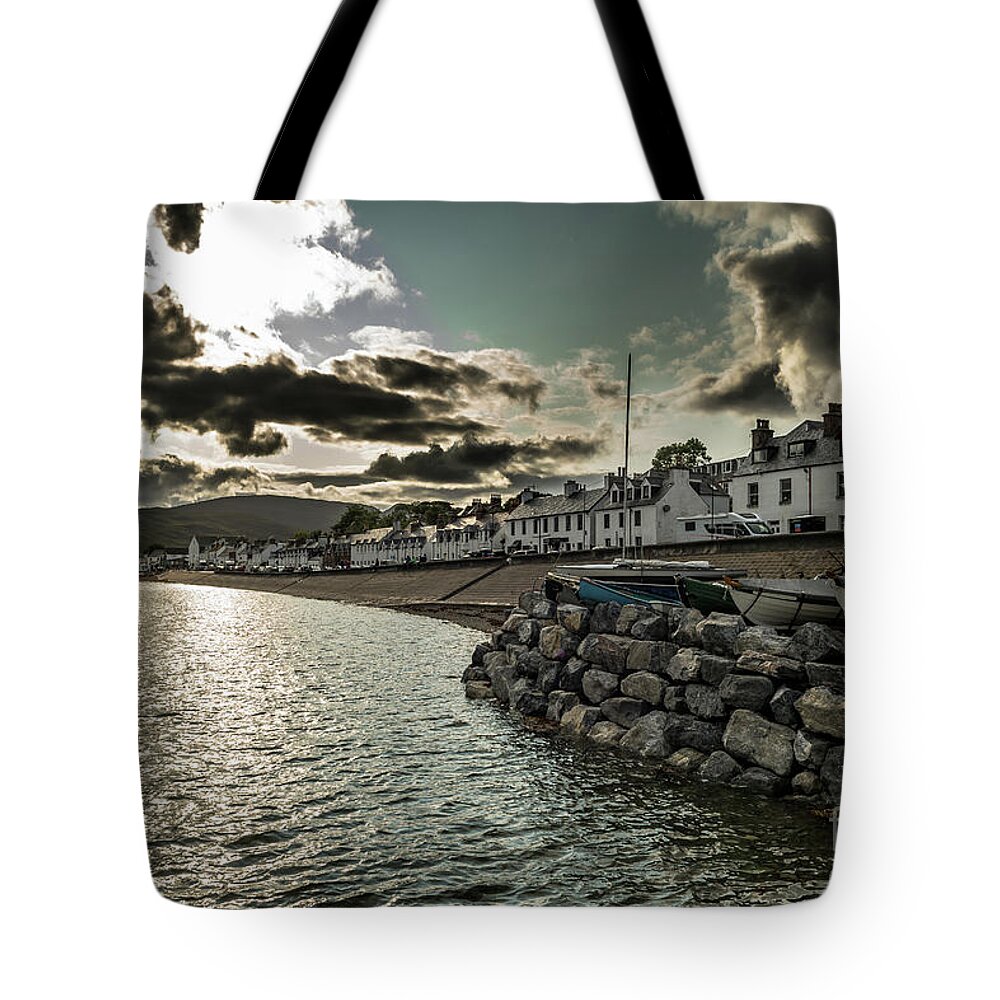 Accommodation Tote Bag featuring the photograph City Of Ullapool With Harbor And Boats Facing Heavy Weather At Loch Broom In Scotland by Andreas Berthold