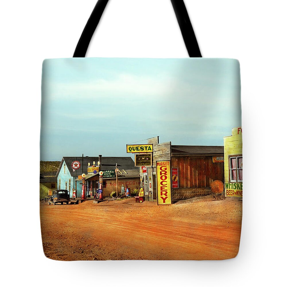 Questa Tote Bag featuring the photograph City - Questa NM - The center of town 1939 by Mike Savad
