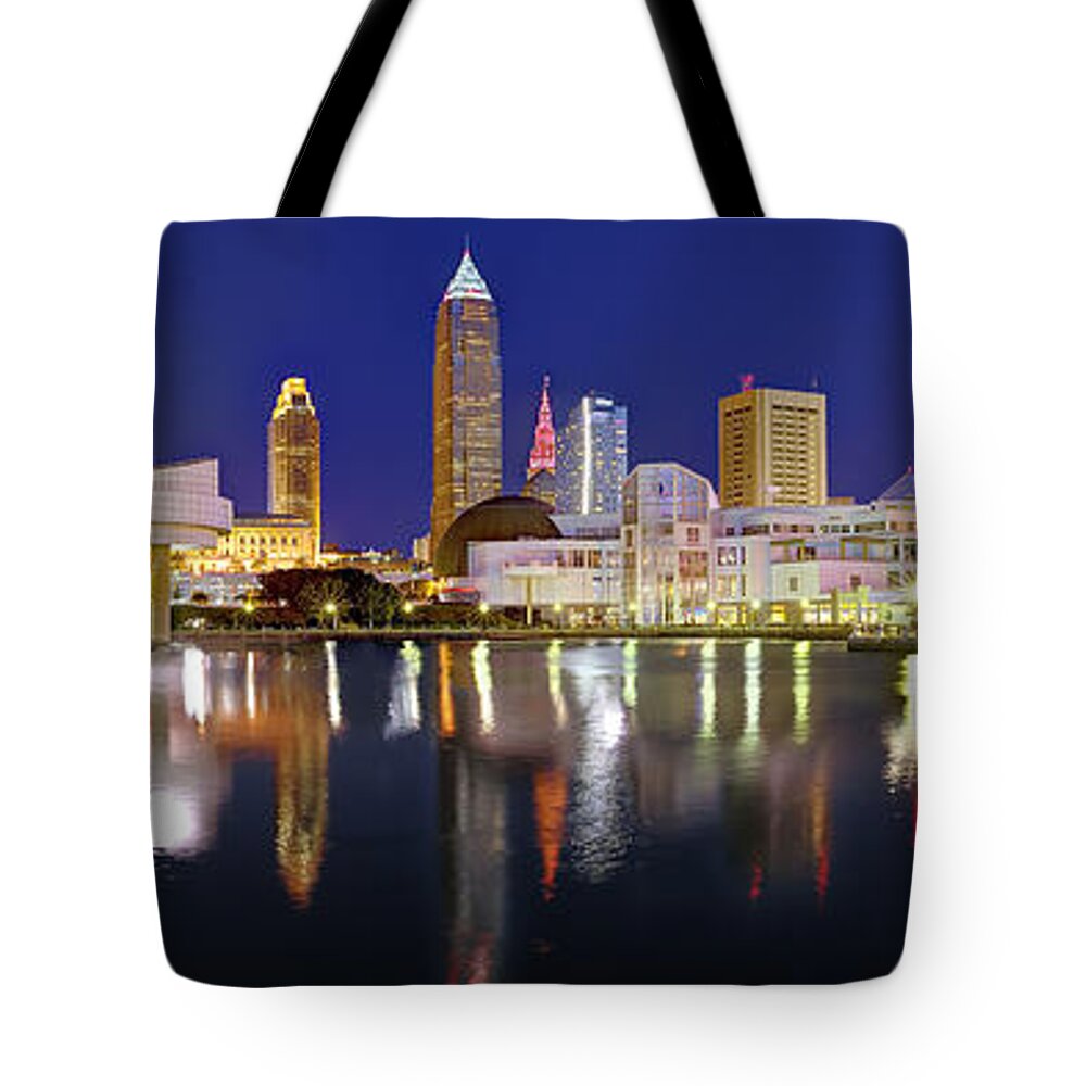 Cleveland Skyline Tote Bag featuring the photograph Cleveland Skyline at Dusk Rock Roll Hall Fame by Jon Holiday