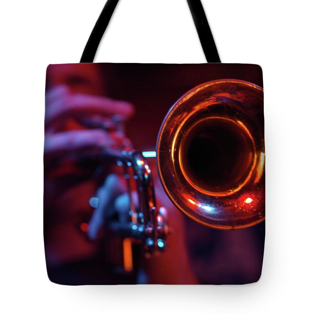 Rock Music Tote Bag featuring the photograph Close-up Of The Cone Of A Trumpet With by Marcart