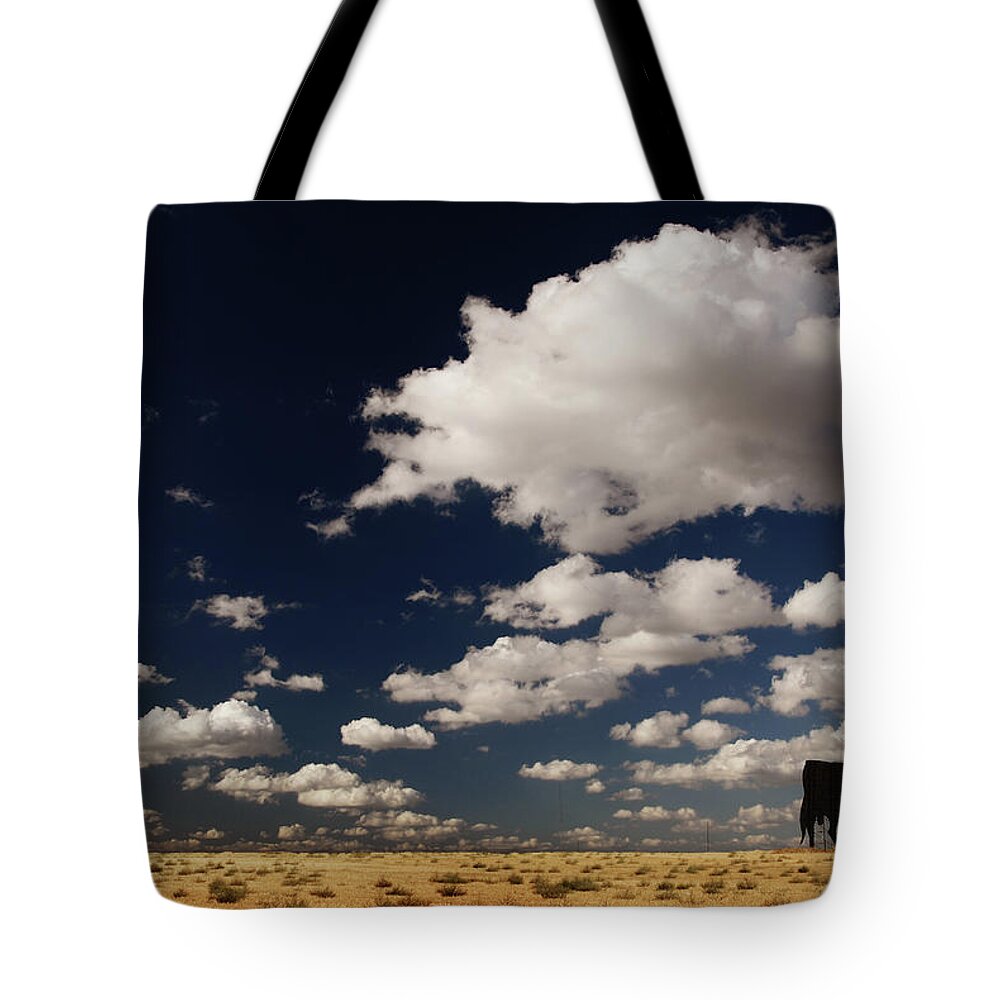 Animal Themes Tote Bag featuring the photograph Clouds And Bull by Photo By Cuellar