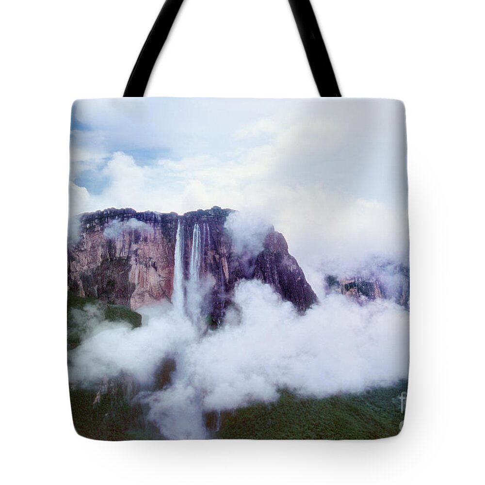 Dave Welling Tote Bag featuring the photograph Clouds Cover Angel Falls In Canaima Np Venezuela by Dave Welling