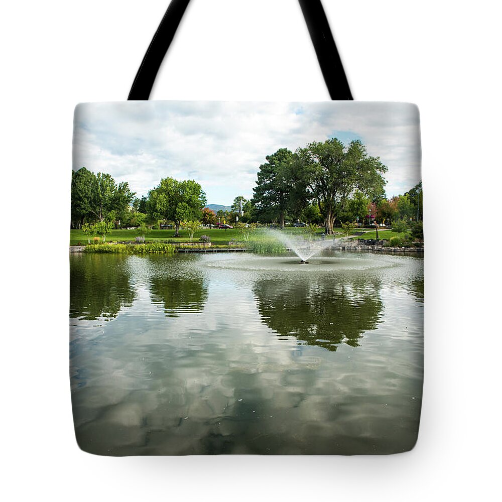 Clouds On Ashley Pond Tote Bag featuring the photograph Clouds on Ashley Pond by Tom Cochran