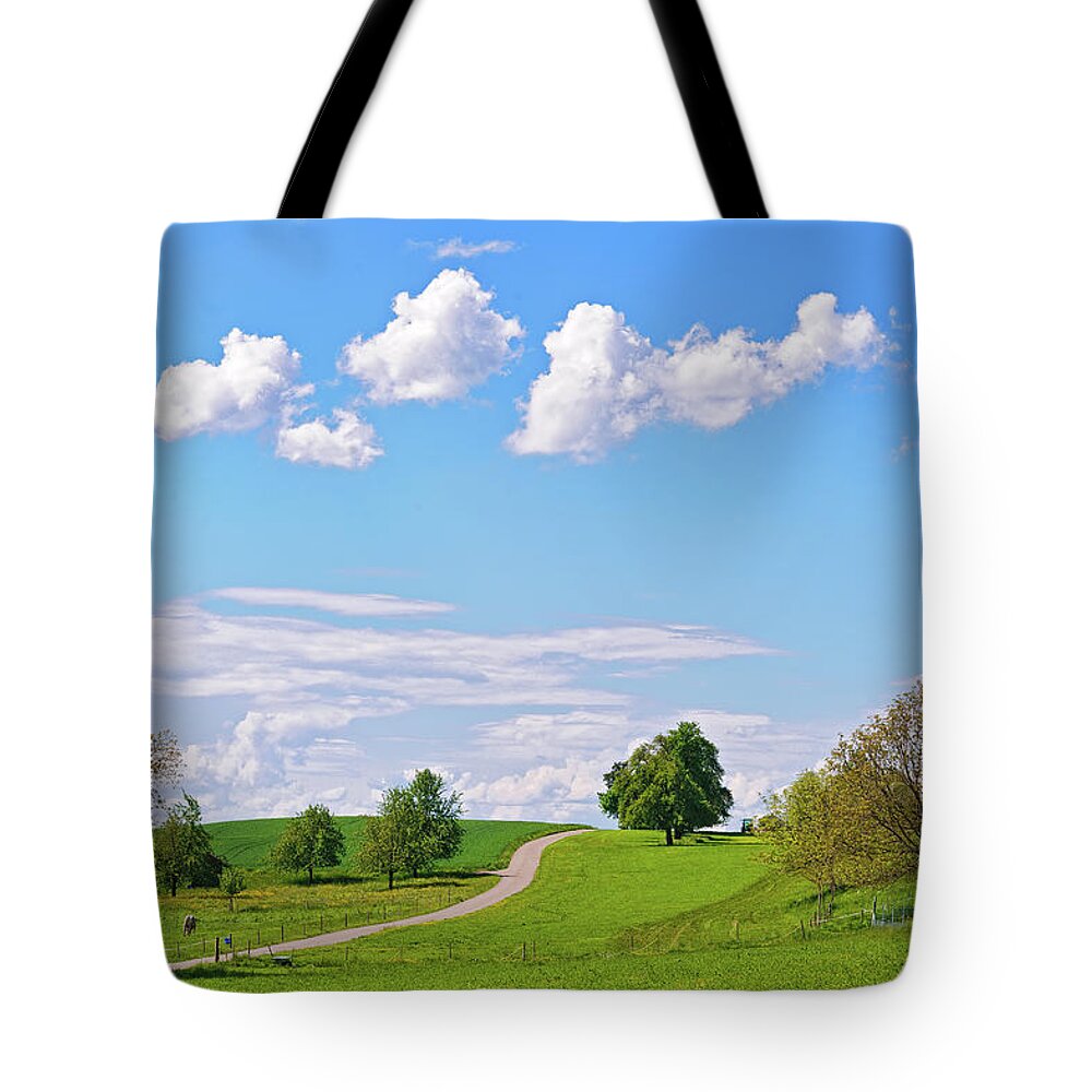 Tranquility Tote Bag featuring the photograph Clouds Over Way by Picture By Tambako The Jaguar