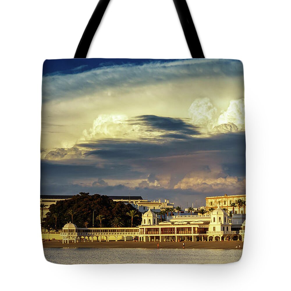 Famous Tote Bag featuring the photograph Cloudy Sky over La Caleta Spa Cadiz by Pablo Avanzini