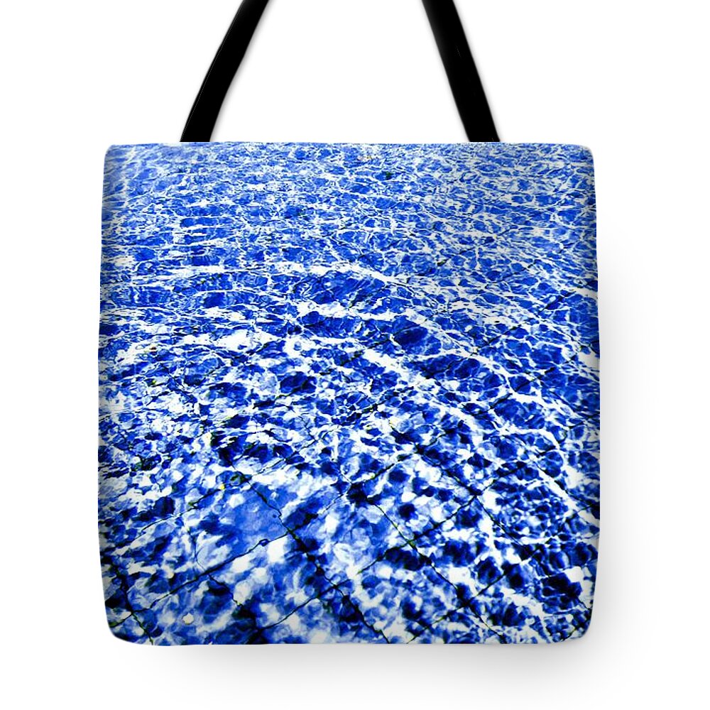 Commotion Tote Bag featuring the photograph Commotion by Dietmar Scherf