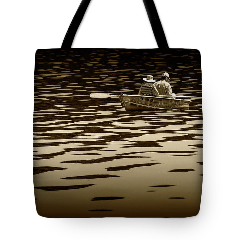 Oarsman Tote Bag featuring the photograph Couple rowing on Stoney Lake at Sunrise in Sepia Tone by Randall Nyhof
