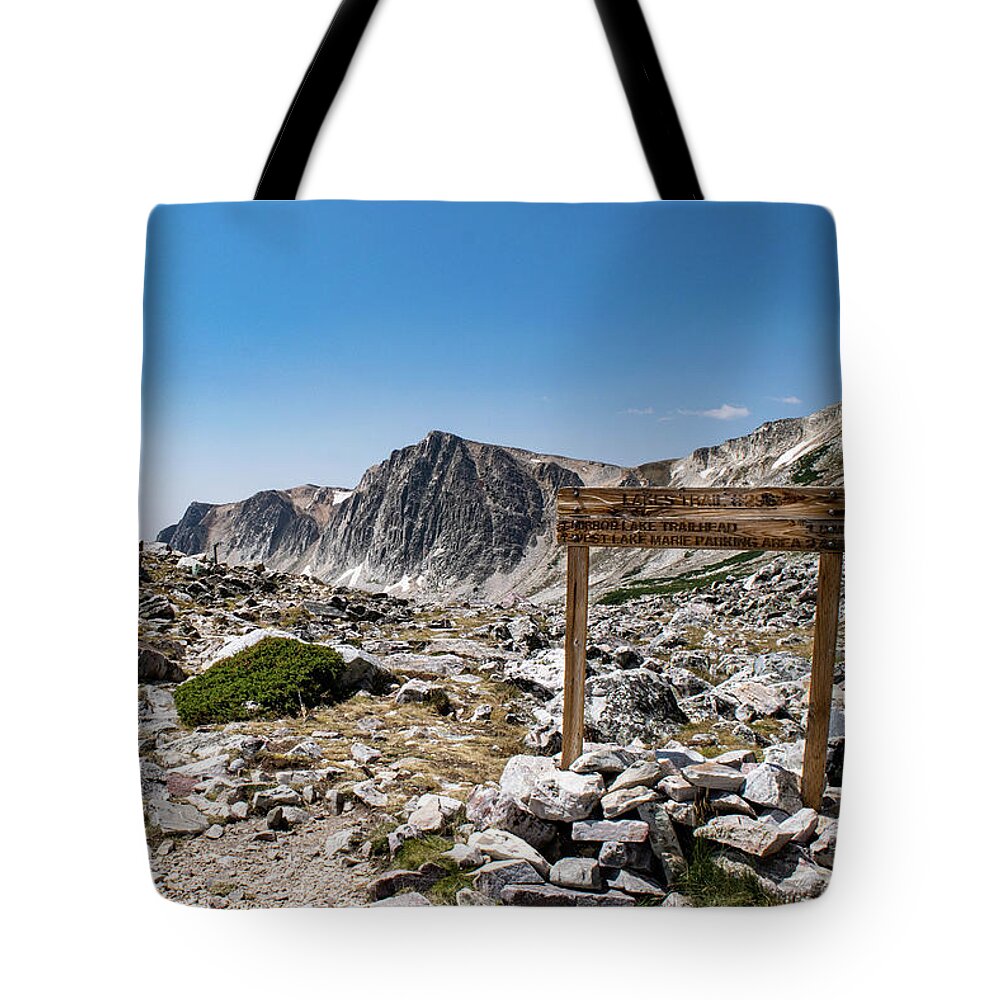 Landscape Tote Bag featuring the photograph Crossroads at Medicine Bow Peak by Nicole Lloyd