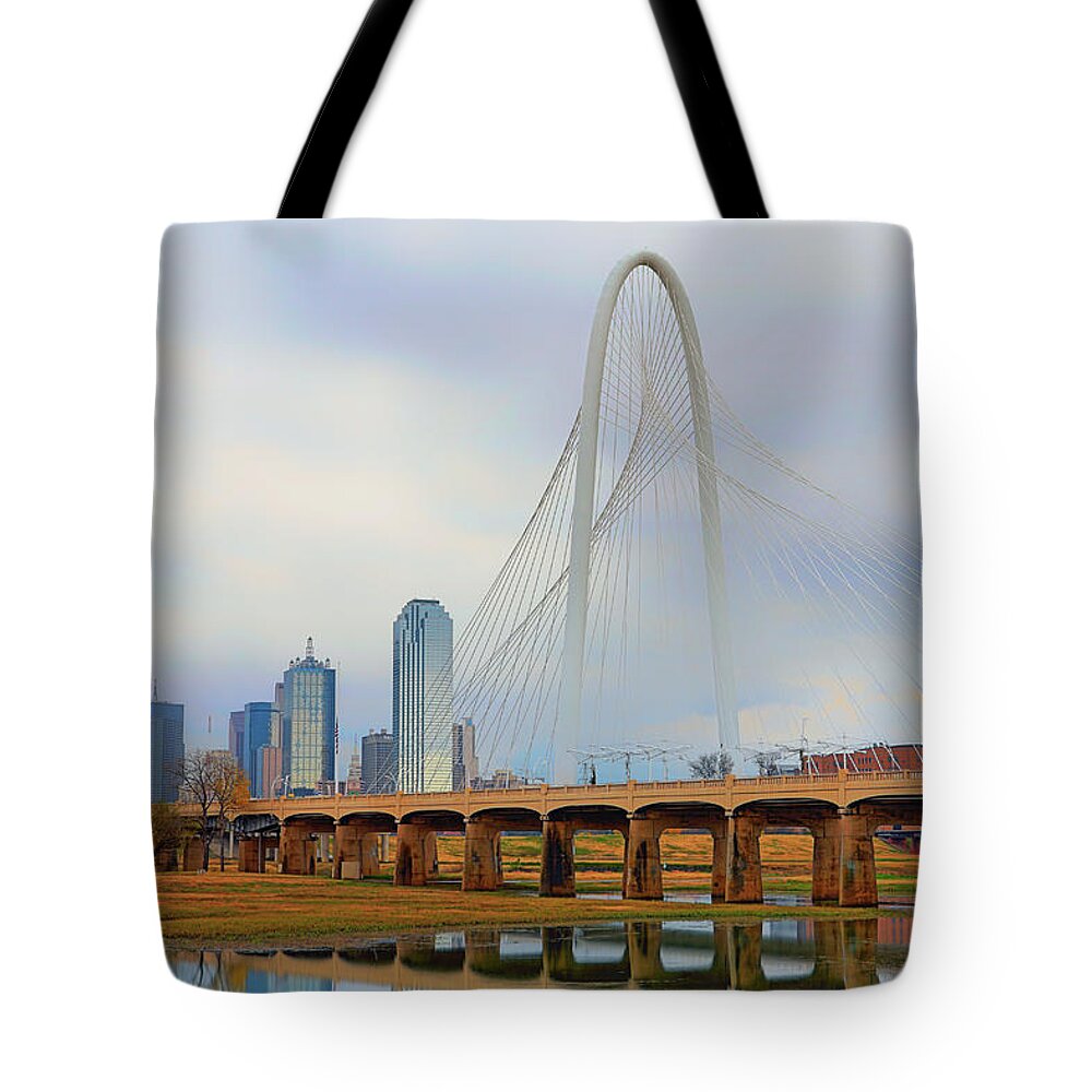 Dallas Skyline Tote Bag featuring the photograph Dallas Skyline with the Margaret Hunt Hill Bridge - Texas - Cityscape by Jason Politte