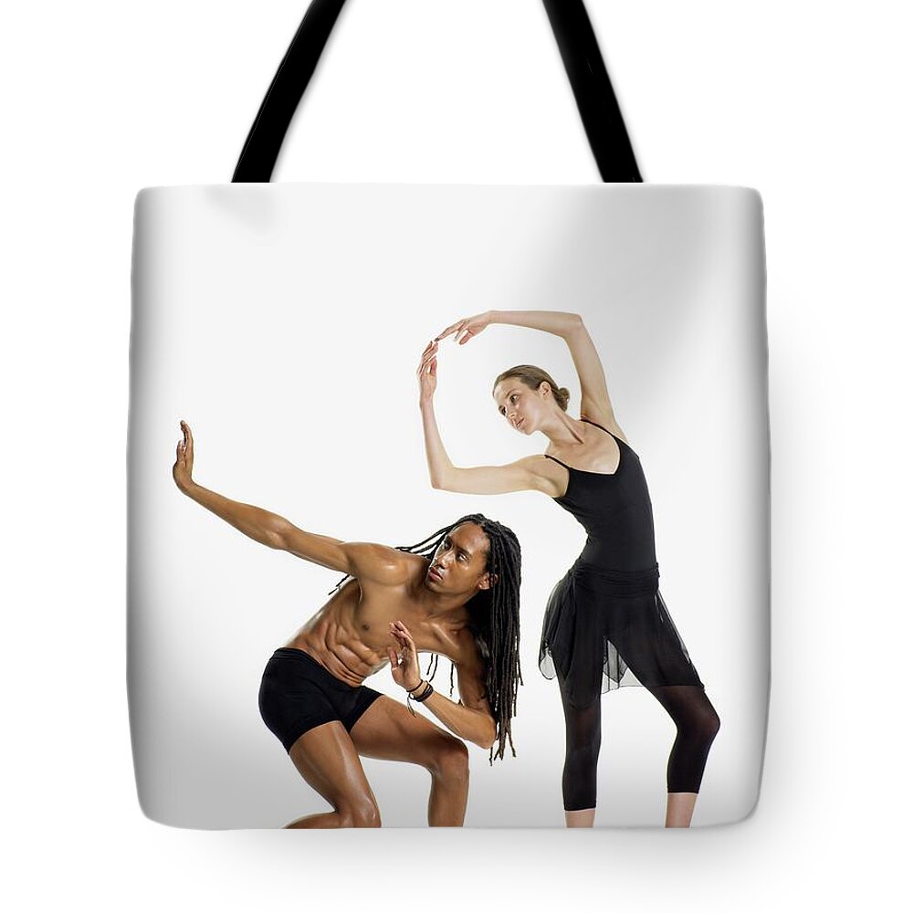 Young Men Tote Bag featuring the photograph Dancers Posing by Image Source