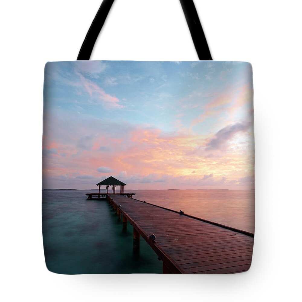 Dawn Tote Bag featuring the photograph Dawn In The Maldives by Simonbradfield