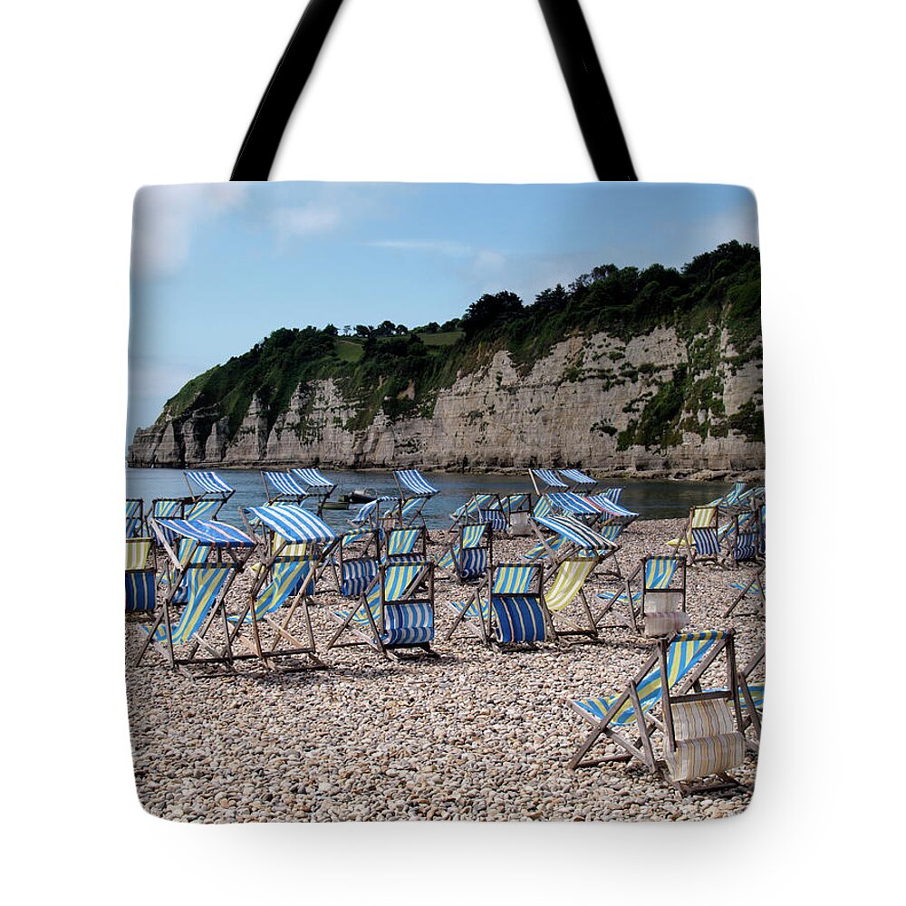 Tranquility Tote Bag featuring the photograph Deckchairs At Beer, Devon, Uk 2013 by Nik Taylor