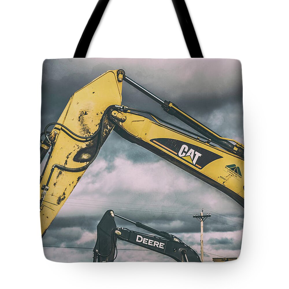 Construction Tote Bag featuring the photograph Deere Cat by Jim Love