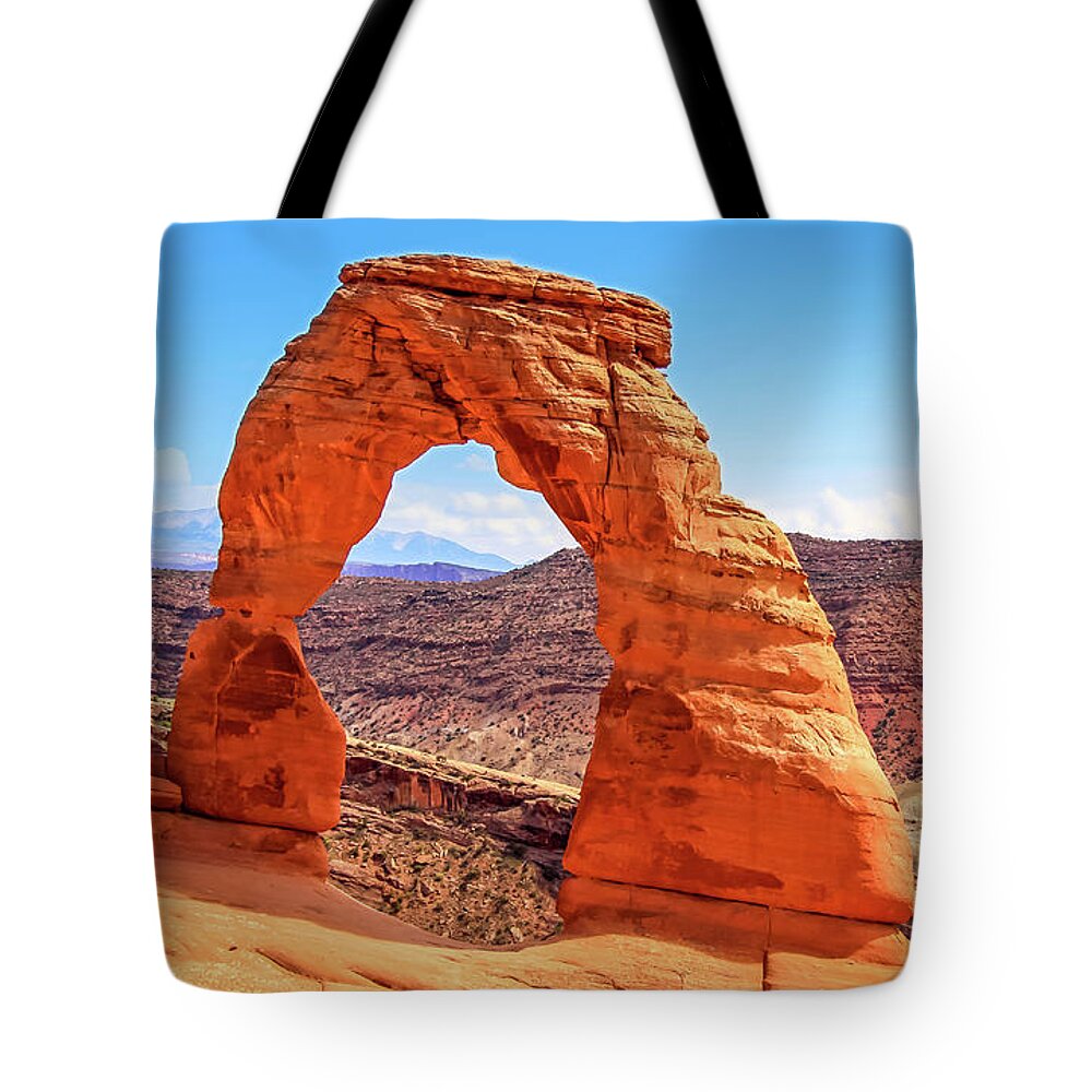 Arches Tote Bag featuring the photograph Delicate Arch Horizon by Dawn Richards