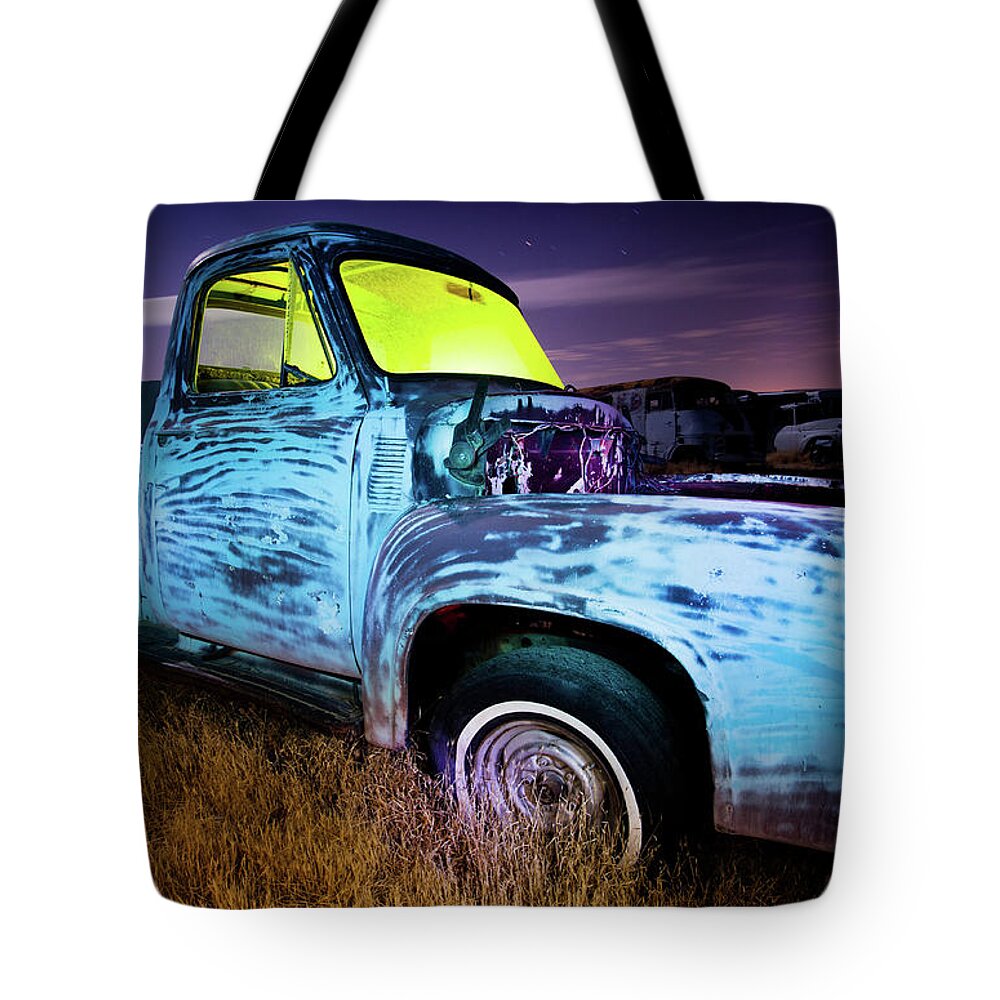 Damaged Tote Bag featuring the photograph Derelict Pickup Truck At Night by Andipantz