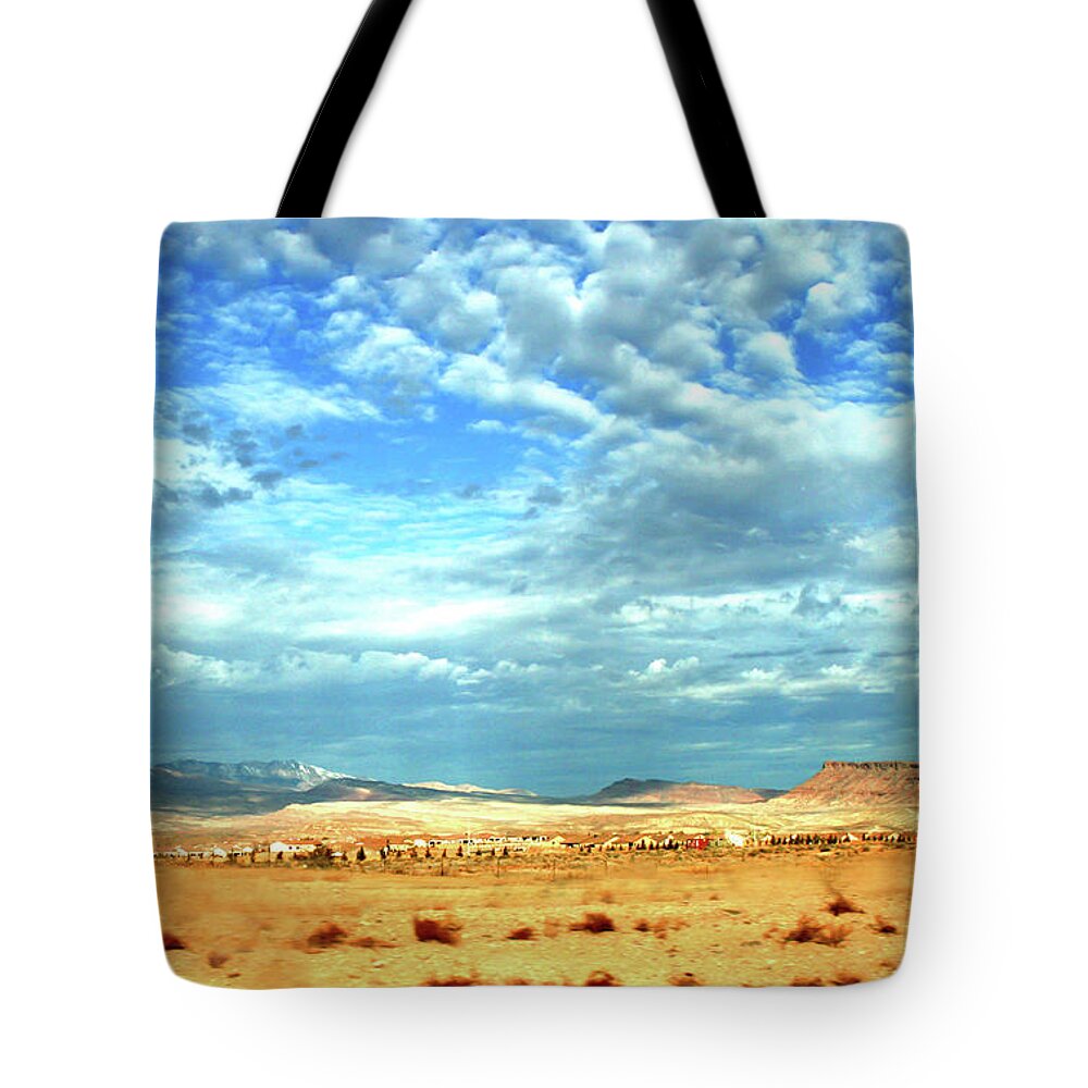 Tranquility Tote Bag featuring the photograph Desert With Clouds In A Deep Blue Sky by Raquel Lonas